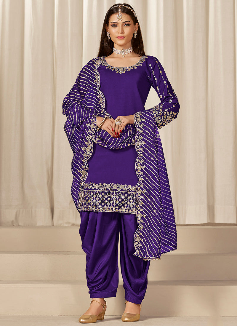 Roman Silk Purple Wedding Wear Zari Embroidery Work Patiala Suit 381205