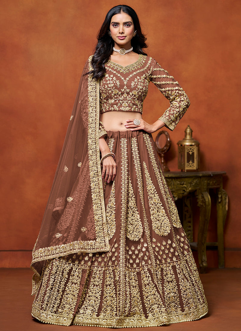 386710 Net Brown Wedding Wear Zari Embroidery Work Lehenga Choli