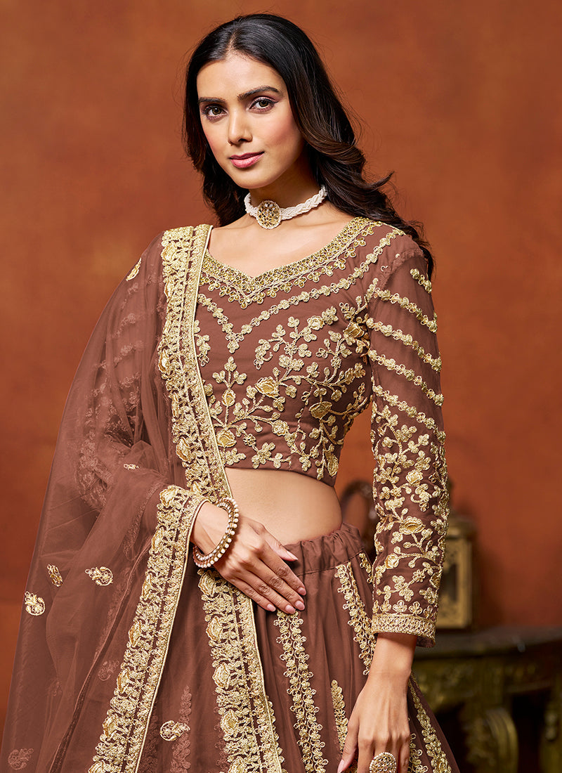 386710 Net Brown Wedding Wear Zari Embroidery Work Lehenga Choli