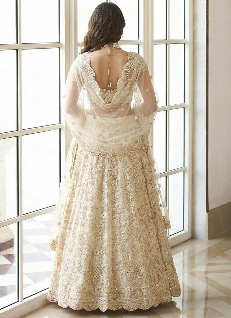 Off White Net Embroidery Work Occasional Wear Lehenga Choli SW201471