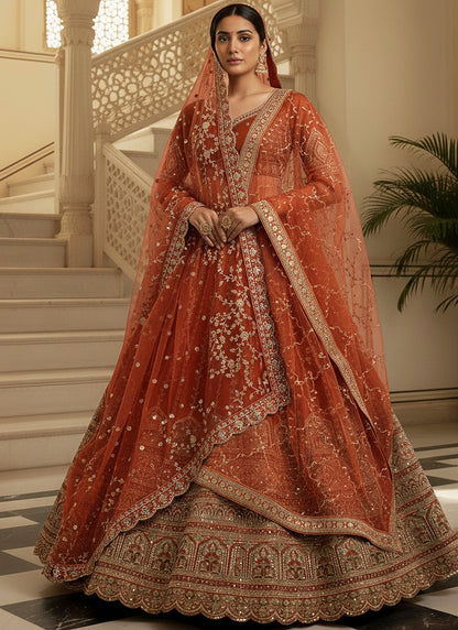 Gadhwal Silk Orange Bridal Wear Heavy Work Lehenga Choli 387445