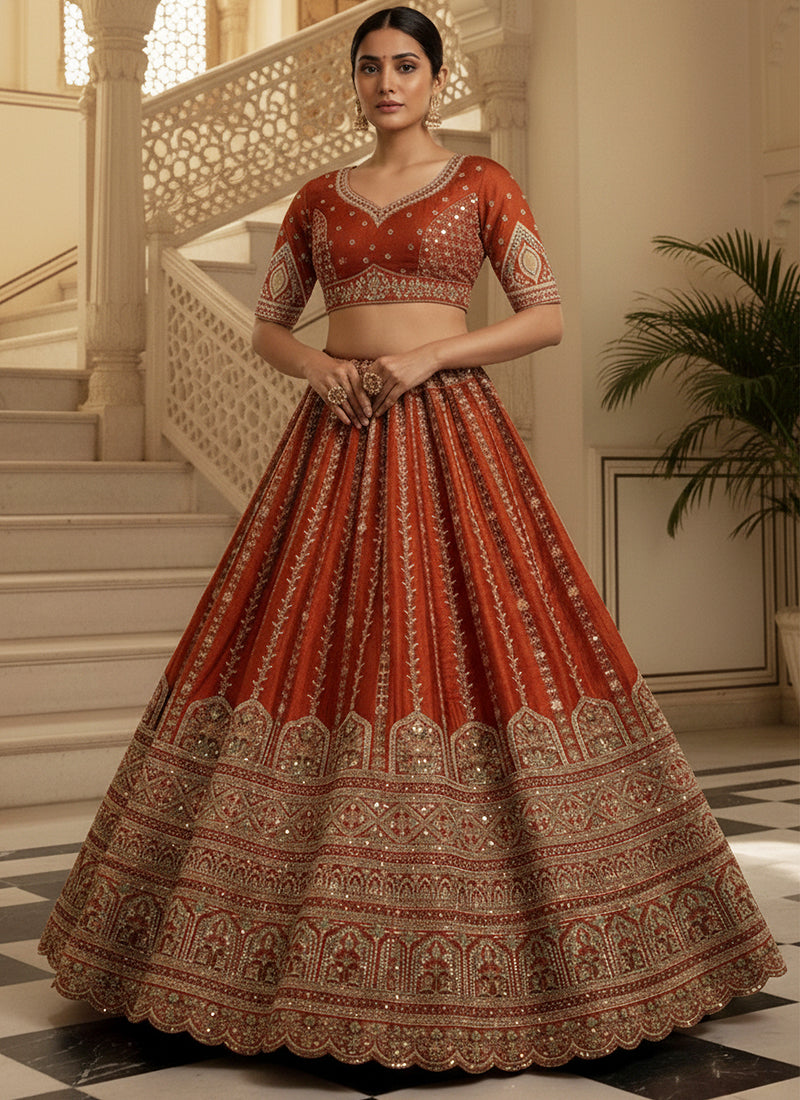 Gadhwal Silk Orange Bridal Wear Heavy Work Lehenga Choli 387445