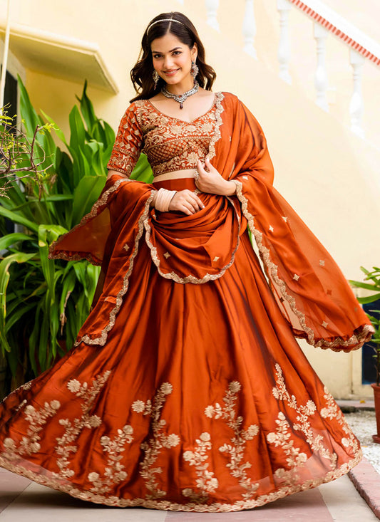 Faux Georgette Rust Orange Wedding Wear Embroidery Work Lehenga Choli 385675