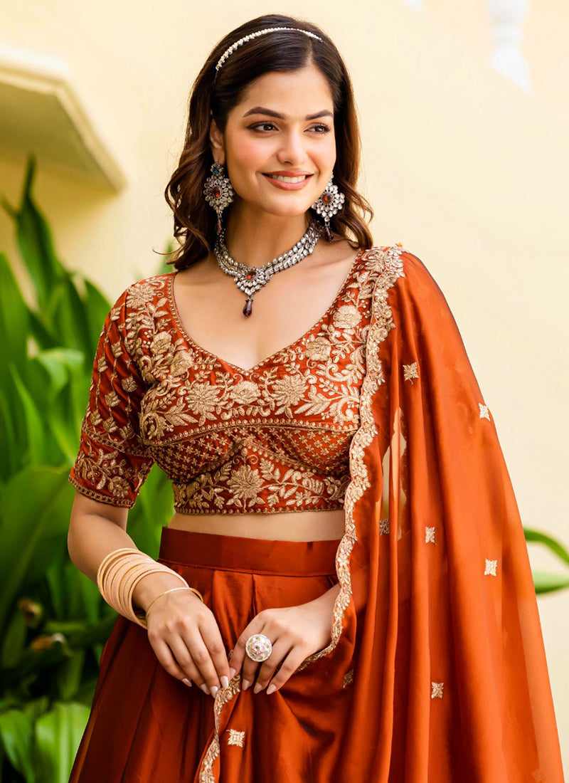 Faux Georgette Rust Orange Wedding Wear Embroidery Work Lehenga Choli 385675