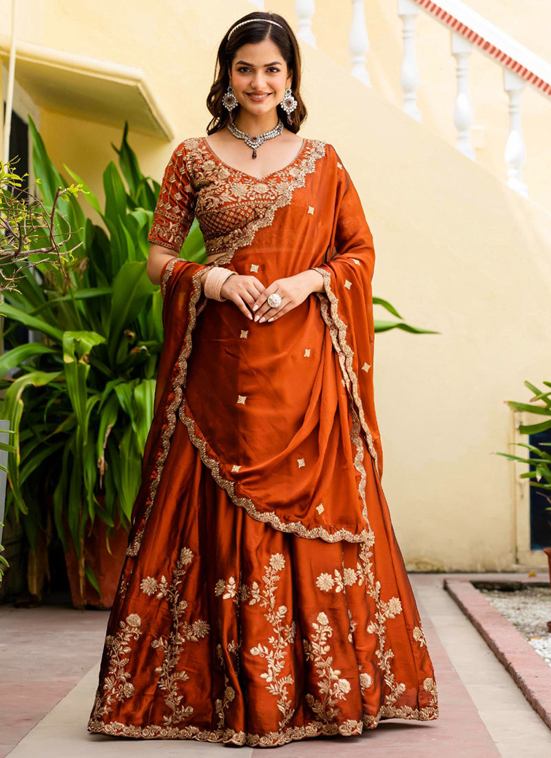 Faux Georgette Rust Orange Wedding Wear Embroidery Work Lehenga Choli 385675