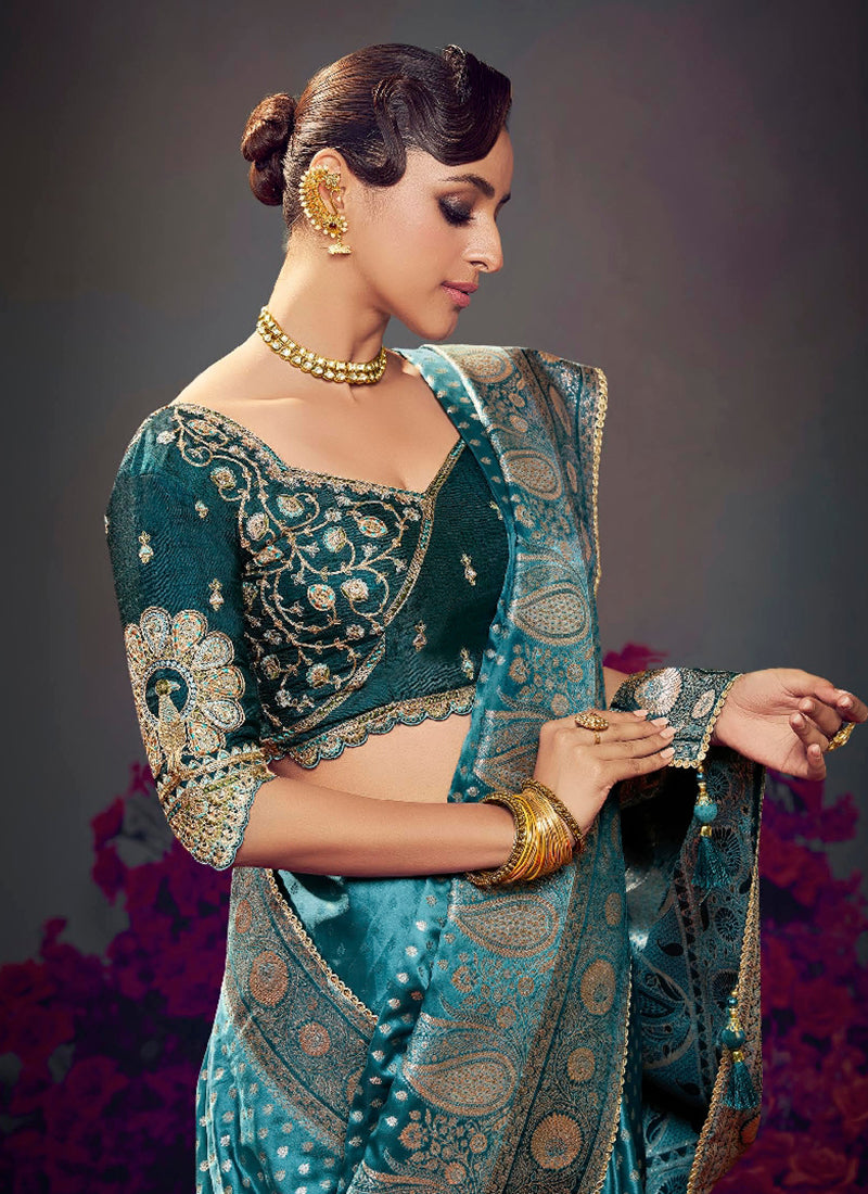 Fancy Fabric Teal Blue Wedding Wear Embroidery Work Saree 385872