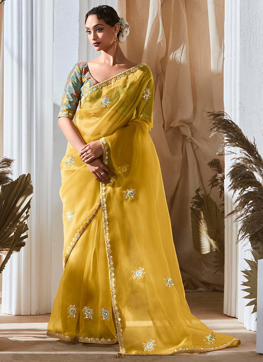 Fancy Yellow Bridal Wear Saree with Lace Work 381690